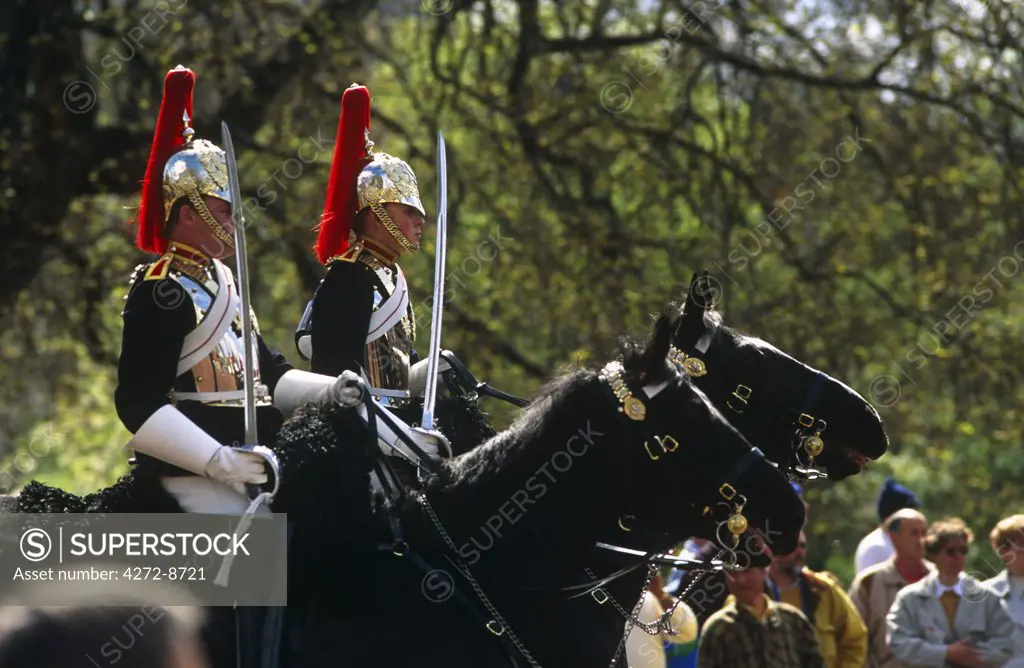 England, London. Household Cavalry outside Buckingham Palace.