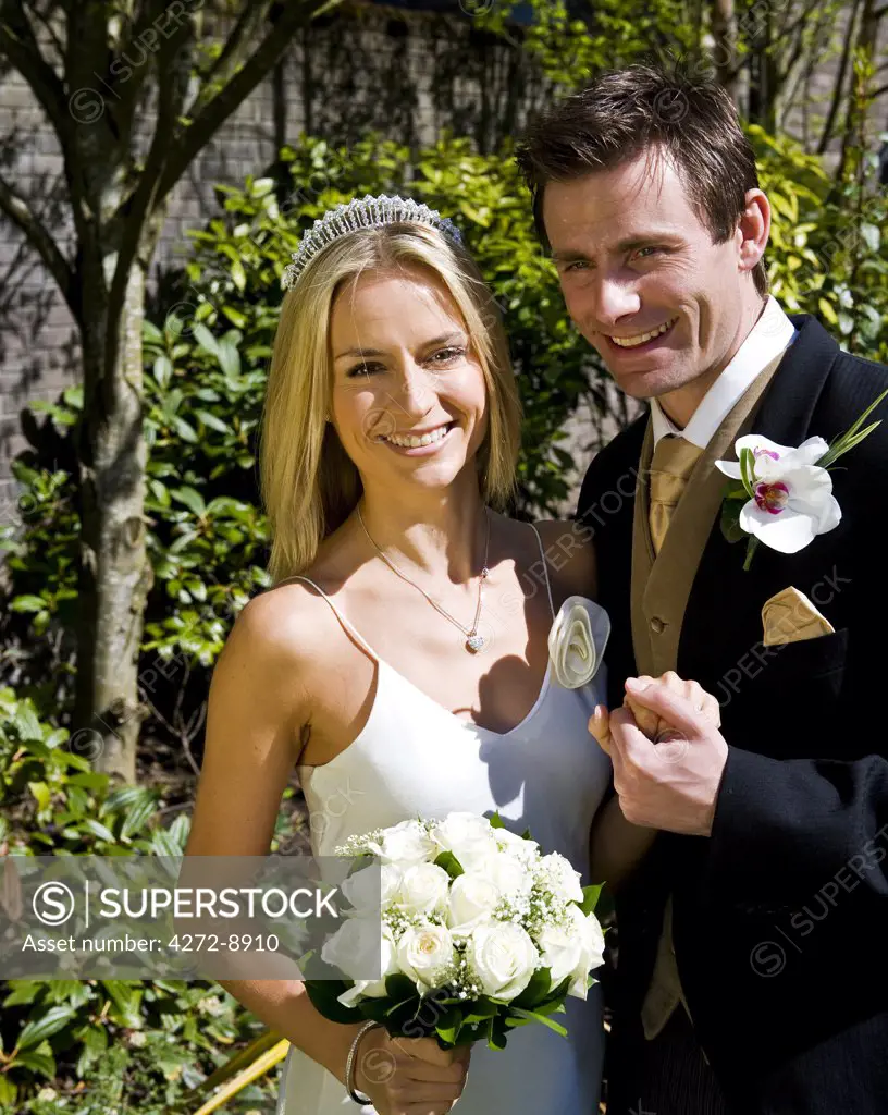 England, Northern Ireland, Londonderry. Bride and Groom during their wedding day at the Everglades Hotel. (MR).