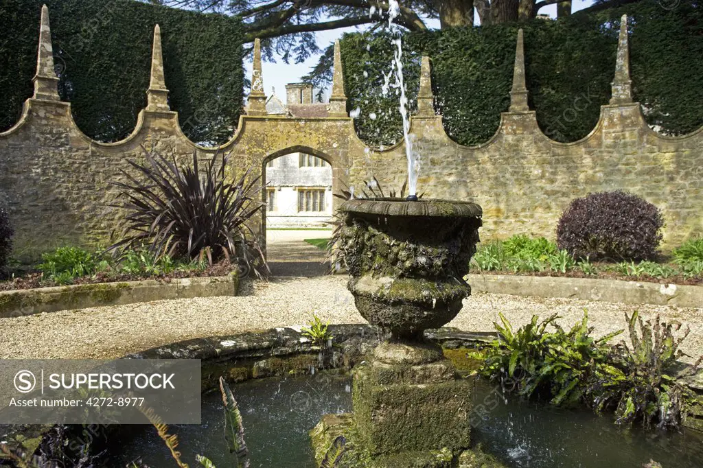 England, Dorset. Athelhampton is one of the finest examples of 15th century manor houses in England. Medieval in style predominantly and surrounded by walls, water features and secluded courts.
