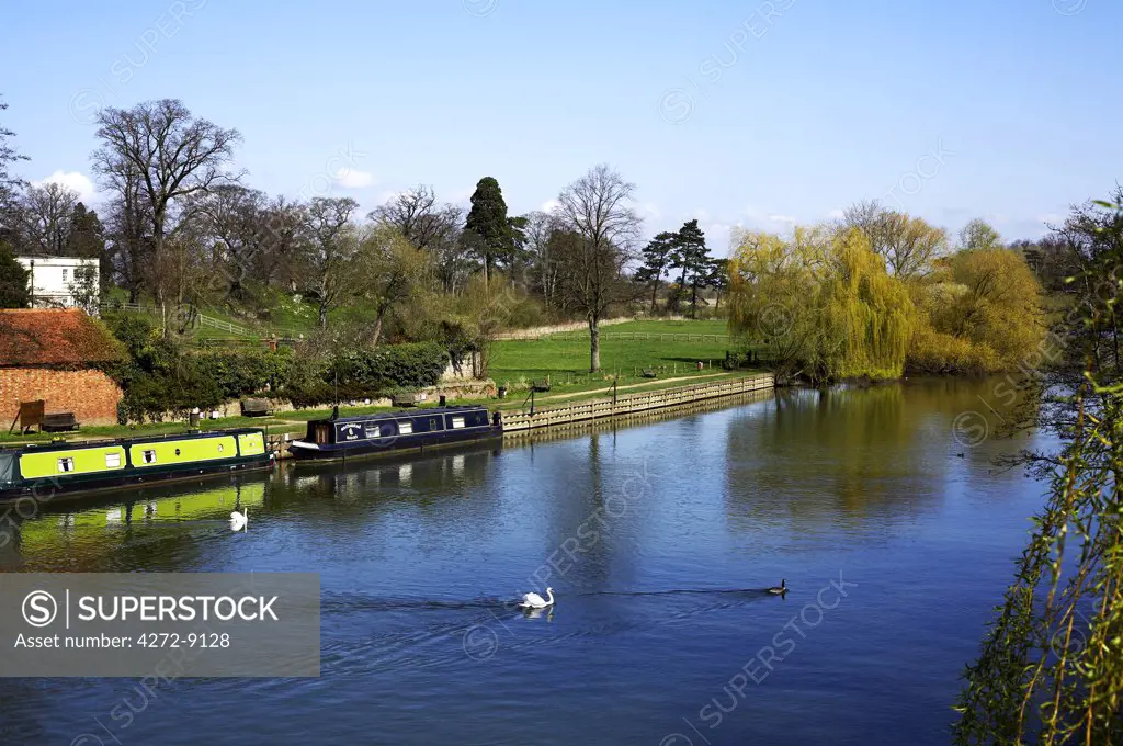 England, Oxfordshire Wallingford. Two barges moored at Wallingford on the River Thames.