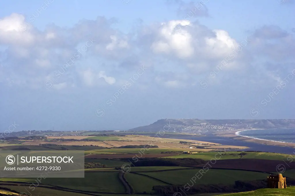 England, West Dorset, St Catherine's Chapel, Abbotsbury. Set high on a hilltop overlooking Abbotsbury Abbey, The Fleet and the UNESCO listed Jurassic Coastline, this sturdily buttressed and barrel-vaulted 14th-century chapel was built by the monks as a place of pilgrimage and retreat.