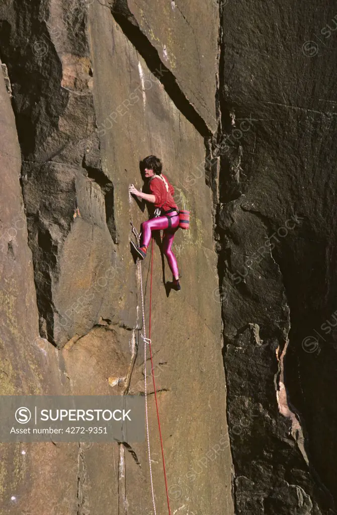England, Derbyshire. Rock climber on the route, White Wall, Millstone Edge, Derbyshire