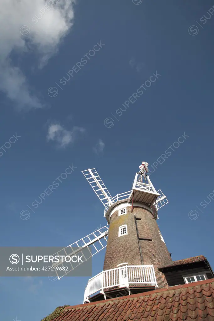 Norfolk, Cley-next-the-Sea. Cley Windmill viewed against a  blue sky.