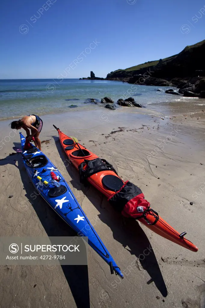 England, Cornwall. Sea kayaking around Britains most southerly point the Lizard Penisula (MR)