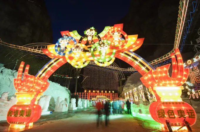 China, Beijing, Longqing Gorge Tourist Park. Ice sculpture festival display of night time illuminations.