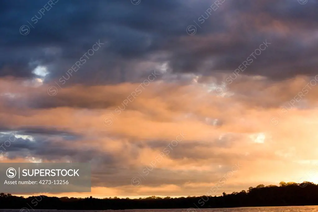 Sunset On Madre De Dios River, Manu National Park In Peru