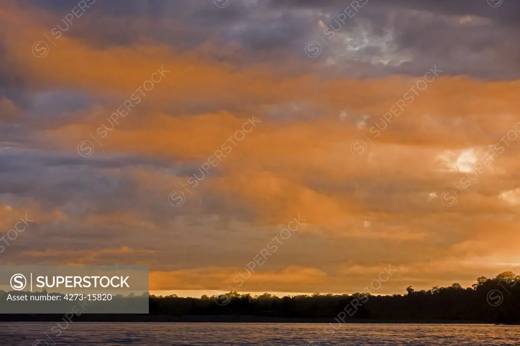 Sunset on  Madre de Dios River, Manu national Park in Peru
