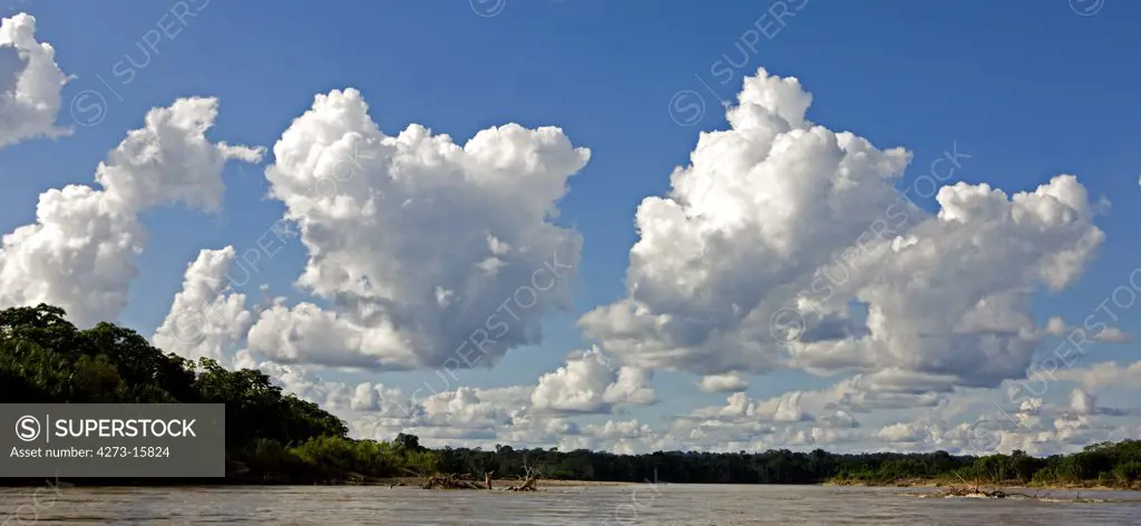 Cloudy Sky on Madre de Dios River, Manu national Park in Peru