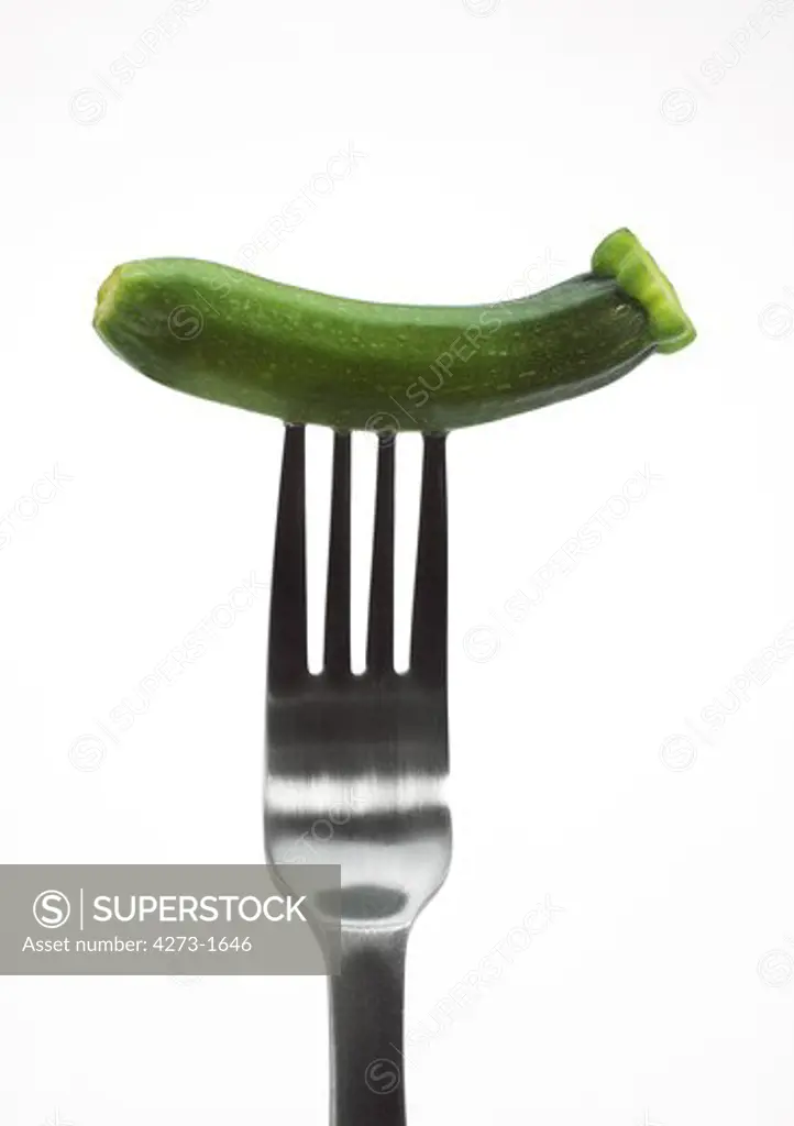 Miniature Long Courgette Or Miniature Zucchini Against White Background
