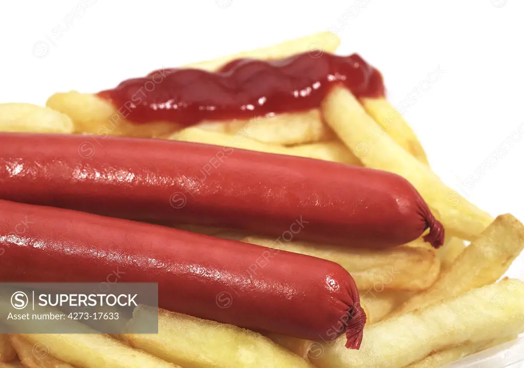 Sausages and French Fries with Ketchup against White Background