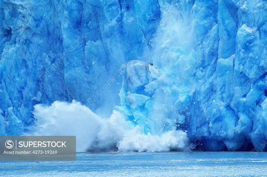 Glacier in Alaska, Piece of Ice falling into Ocean, Symbol for the lobal Warming