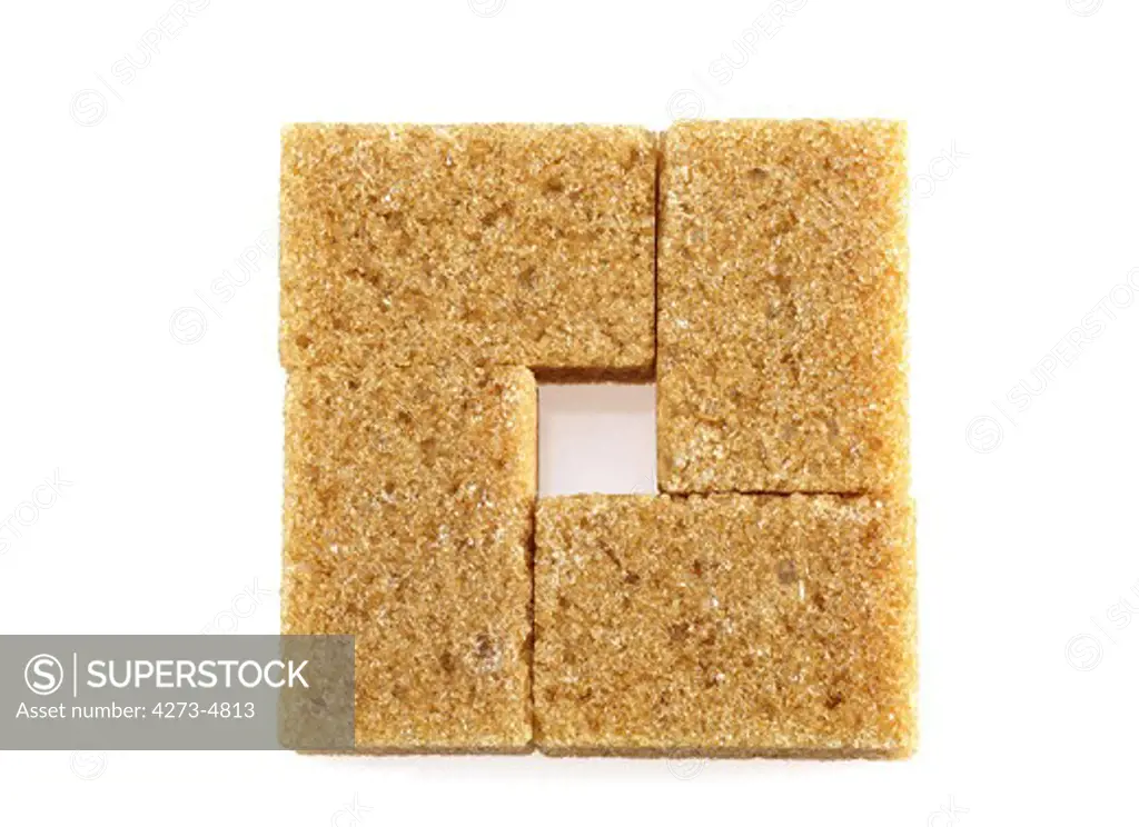 Cubes Of Brown Sugar Against White Background