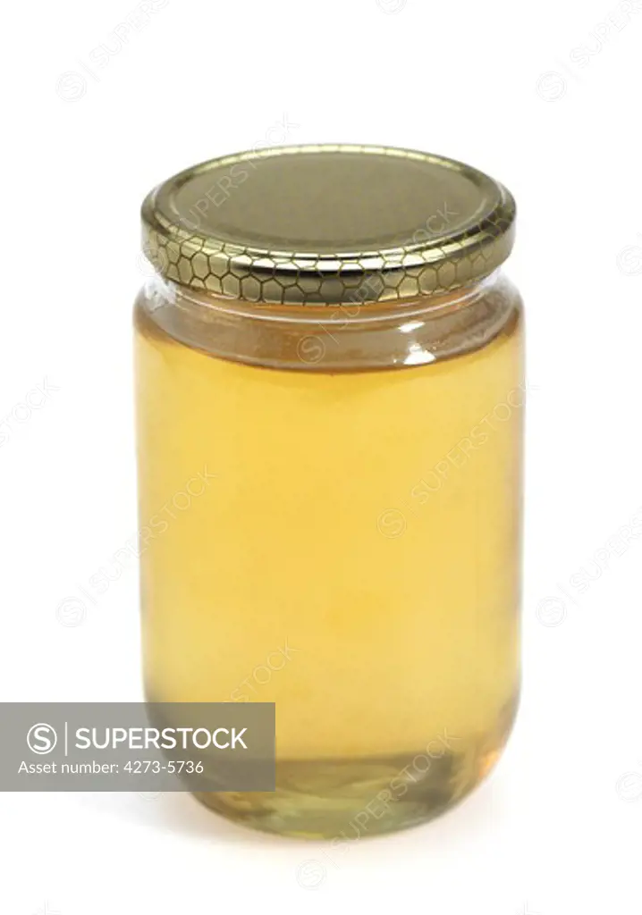 Jar Of Honey Against White Background