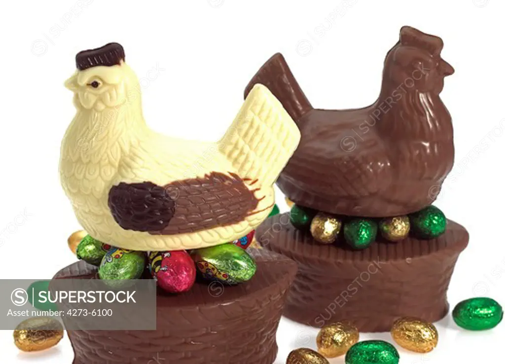 Chocolate Easter Hen And Eggs Against White Background