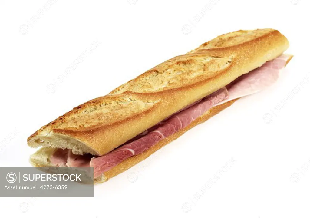 Sandwich With Ham And Butter Against White Background