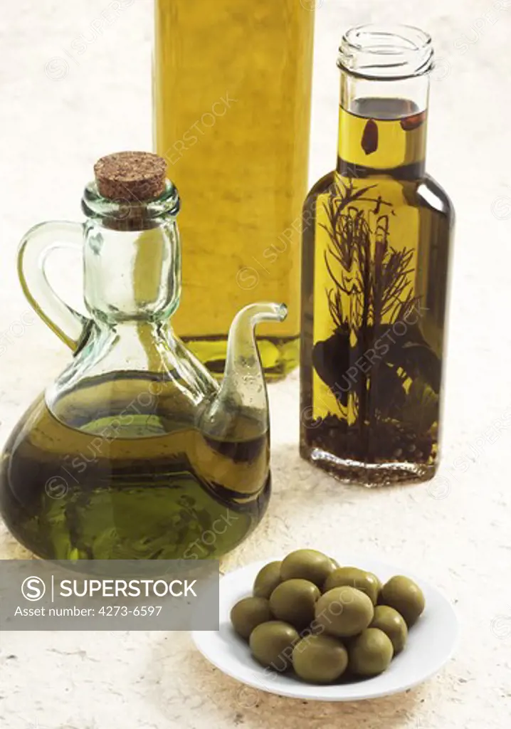 Olive Oil Bottle, And Green Olives Olea Europaea