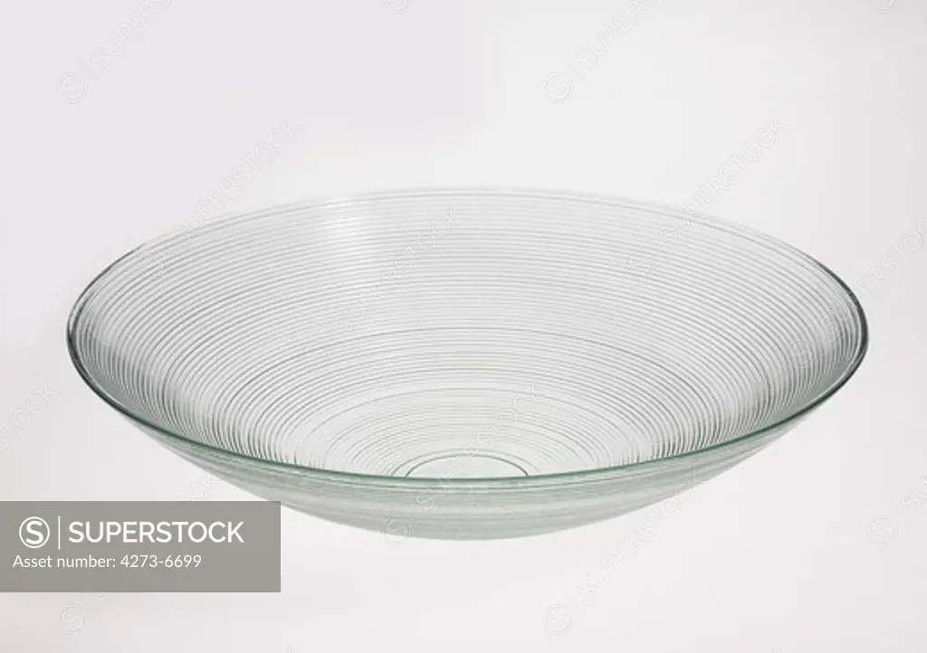 Glass Fruit Bowl Against White Background