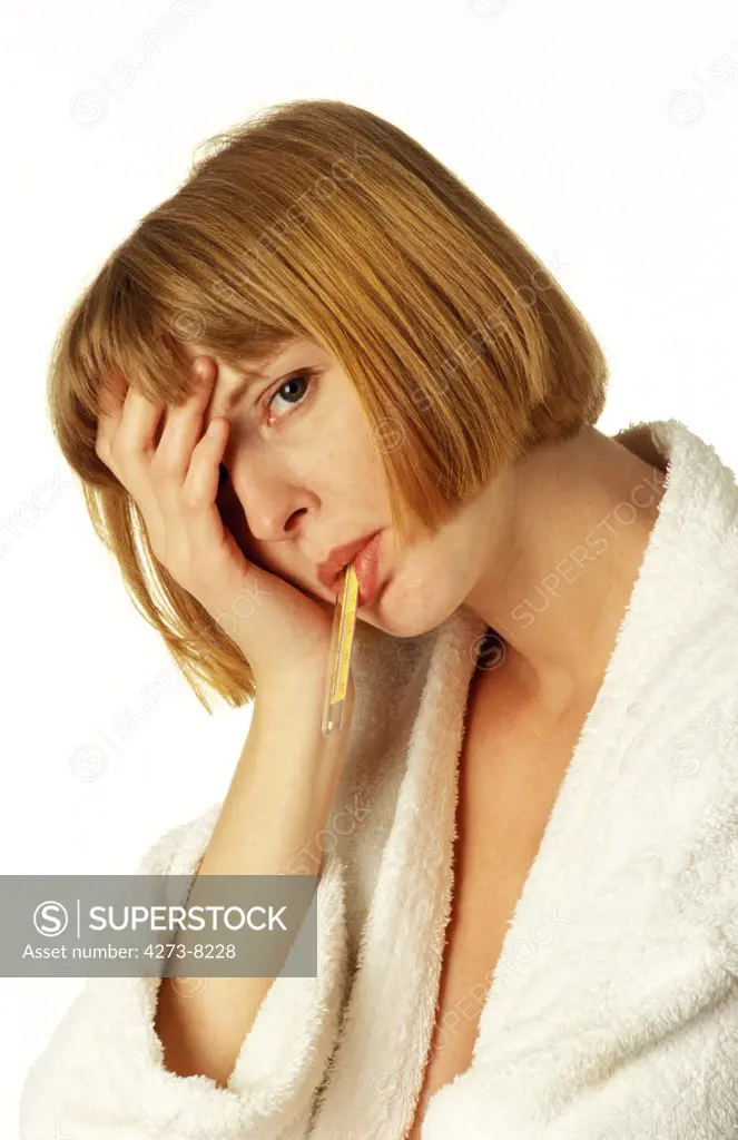 Woman In Bath Robe Taking Her Temperature