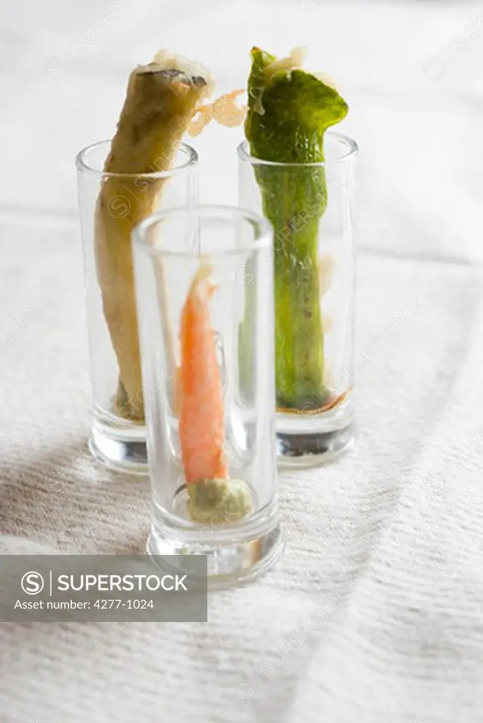 Vegetable tempura served in glasses with wasabi and soy sauce
