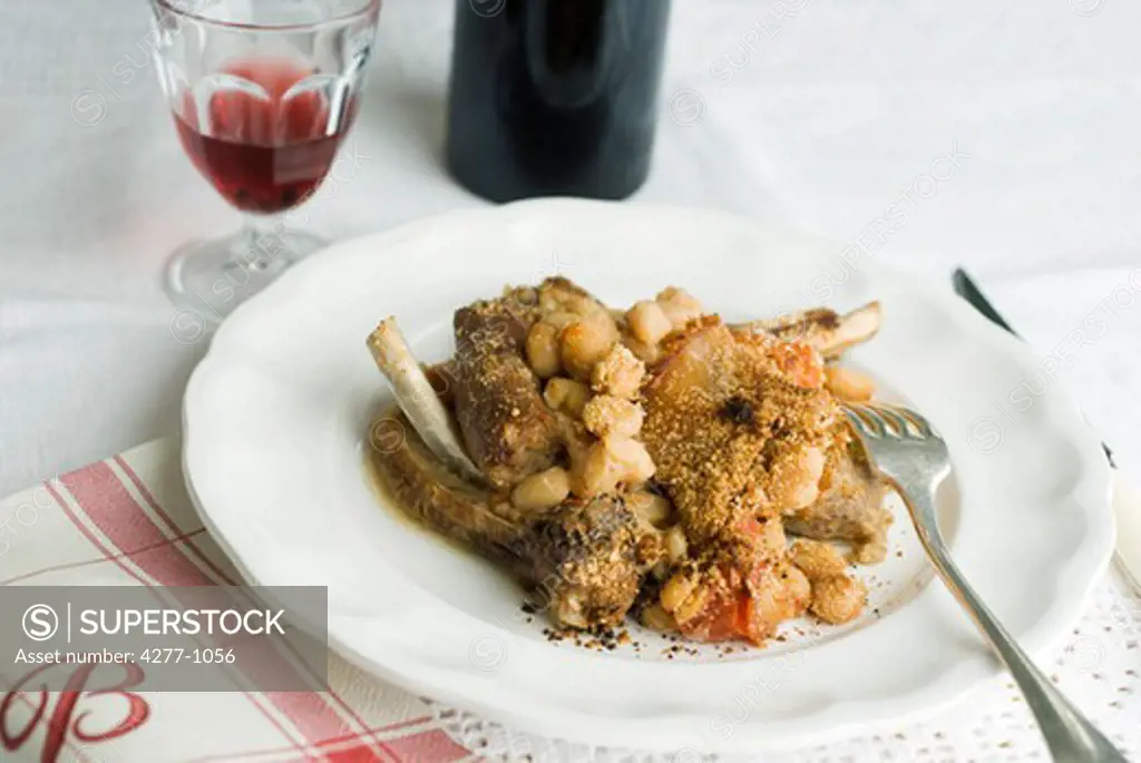 Cassoulet with fresh beans, served with red wine