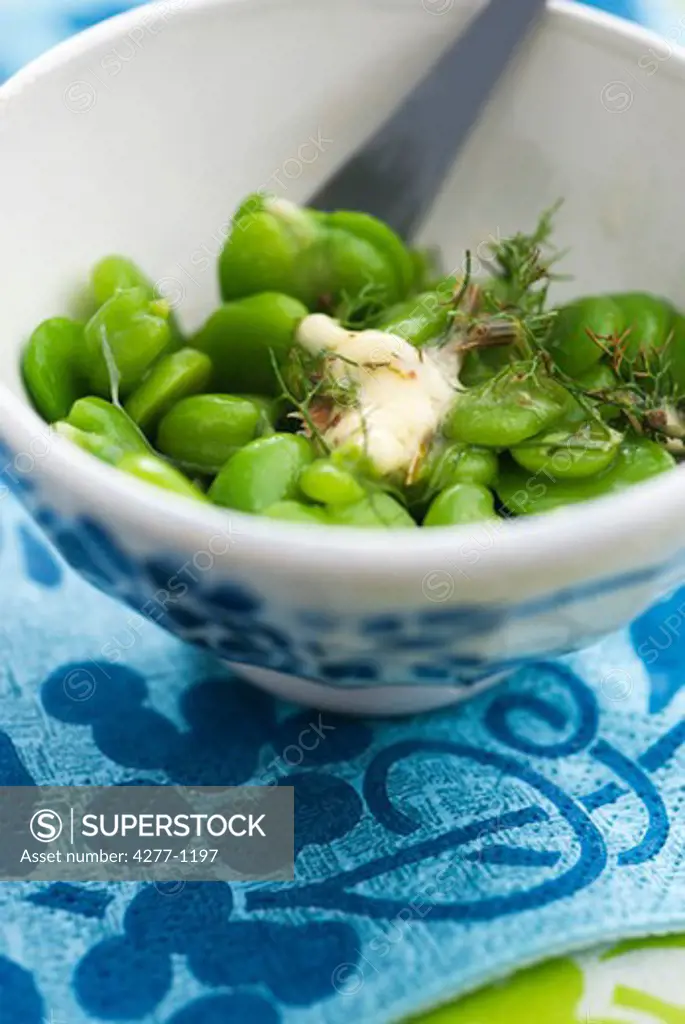 Peas topped with pastis butter
