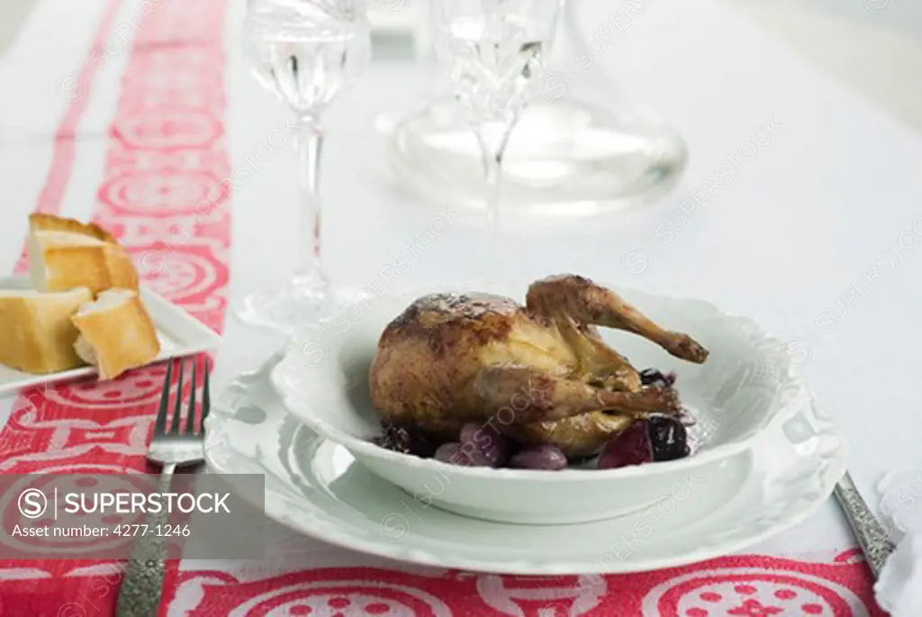Braised quail with grapes