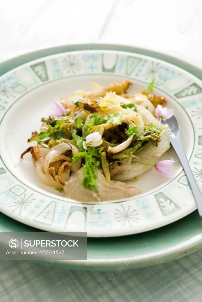 Chicory with tahini sauce and crispy onions