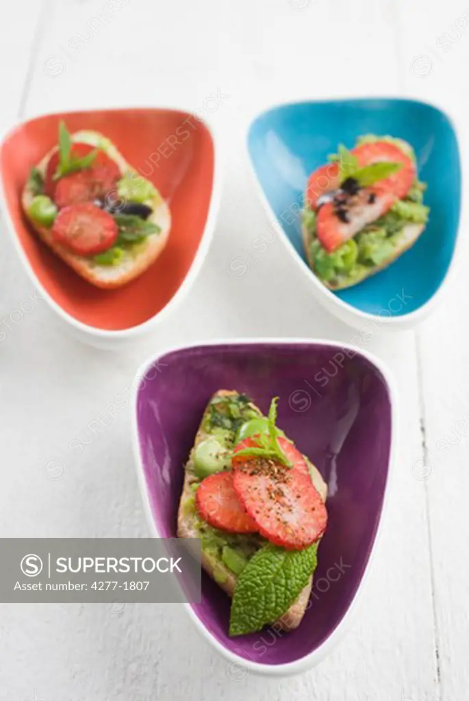 Broad bean and strawberry toasts