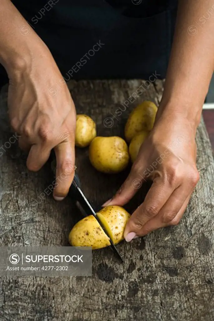 Cutting baby potatoes
