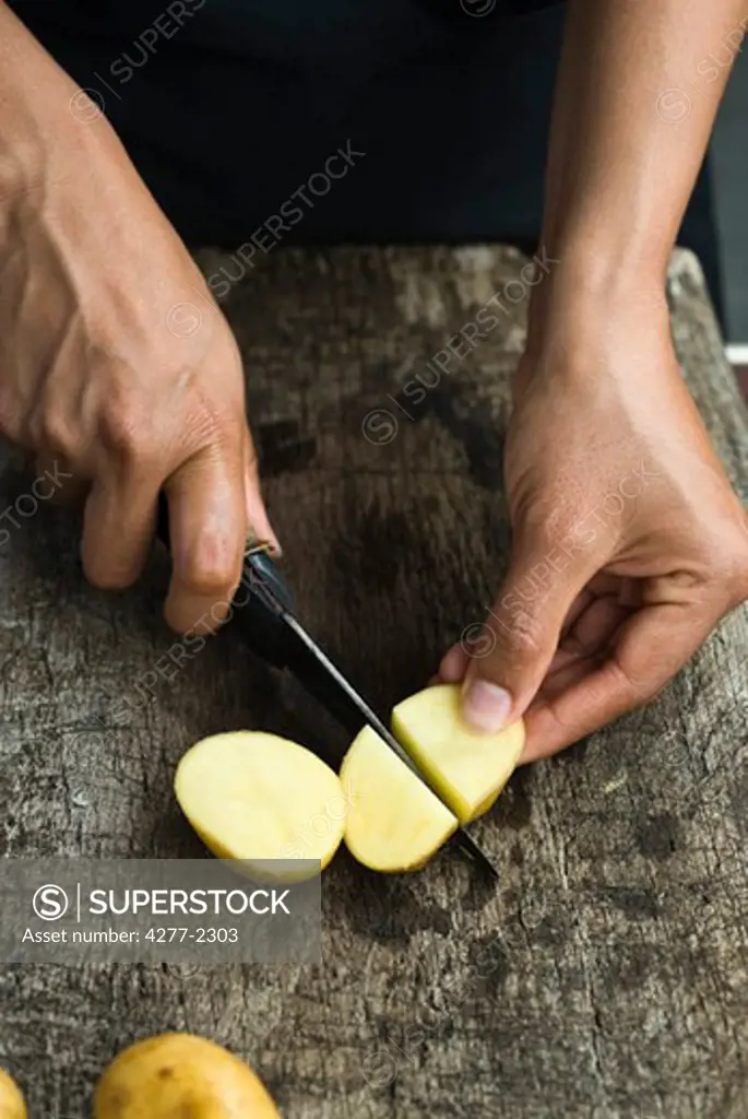 Cutting baby potatoes