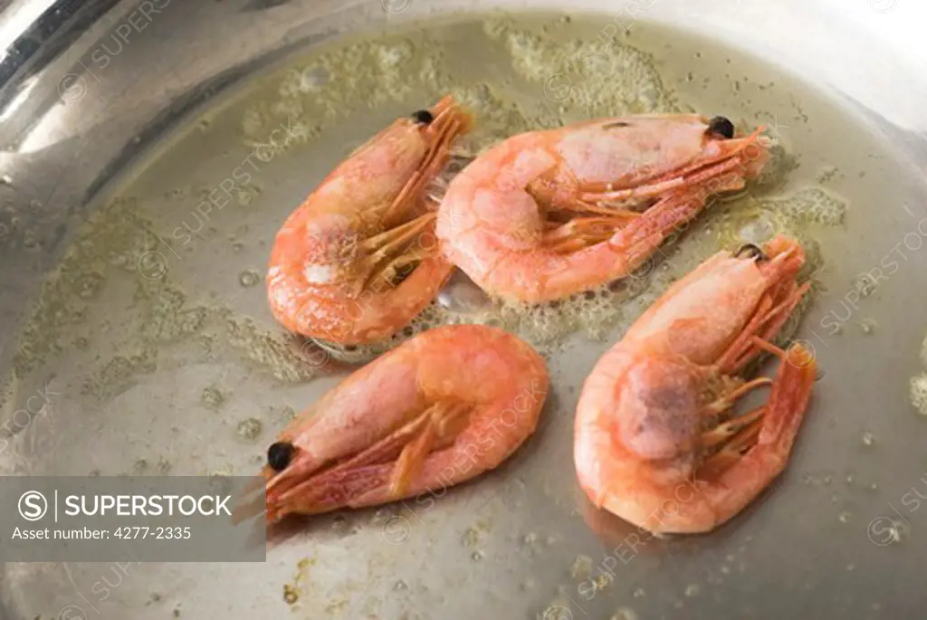 Sauteing shrimp in butter