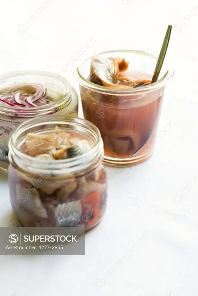 Pickled herring in jars