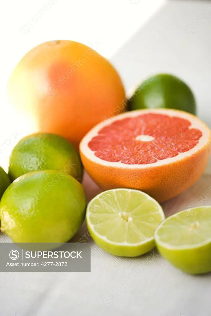 Grapefruit half with limes