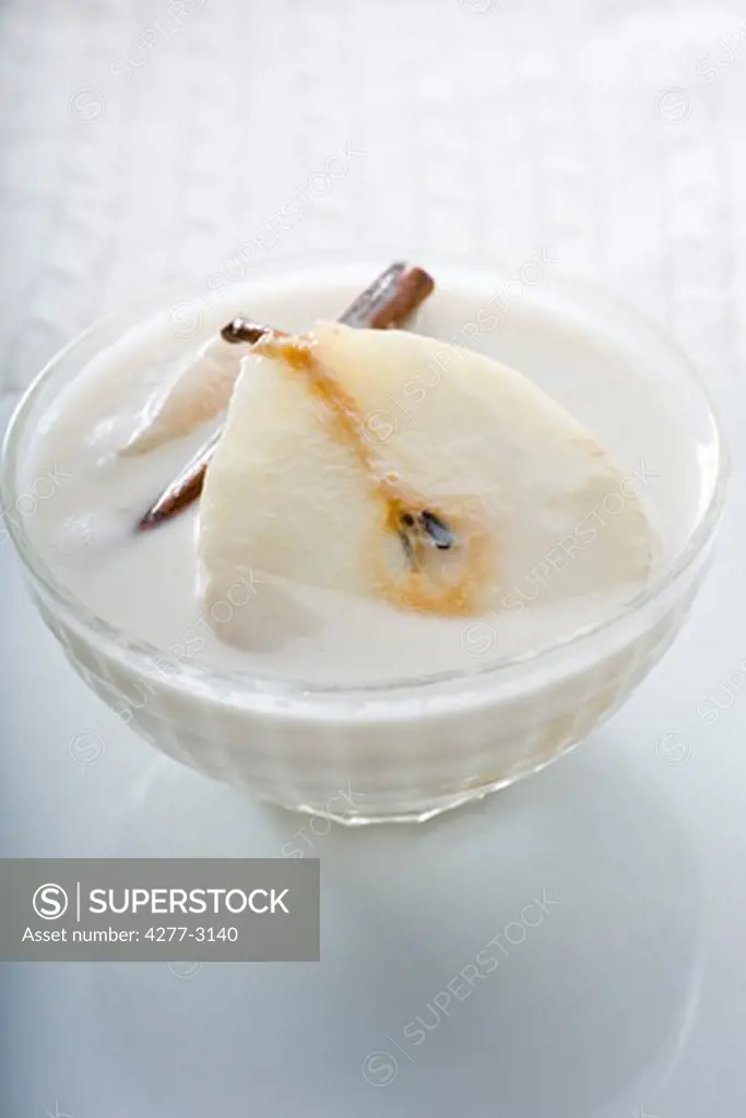Pears poached in coconut milk