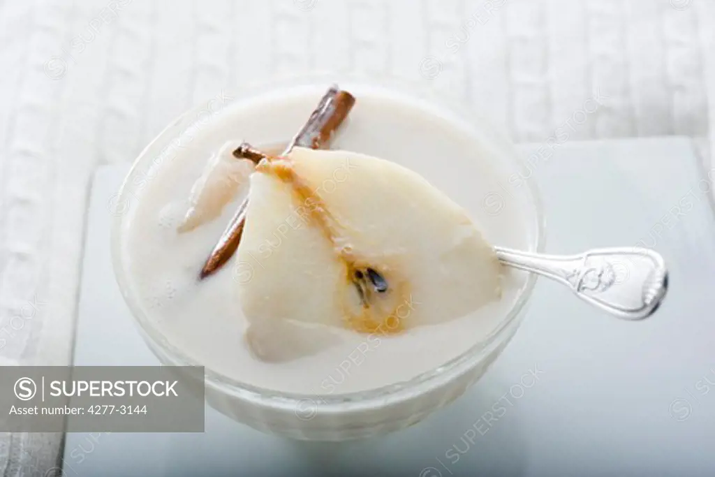 Pears poached in coconut milk