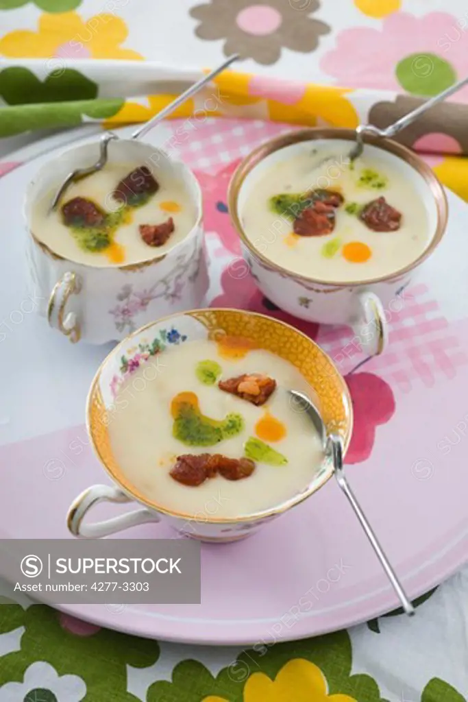Cream of potatoe soup with chorizo and parsley pesto