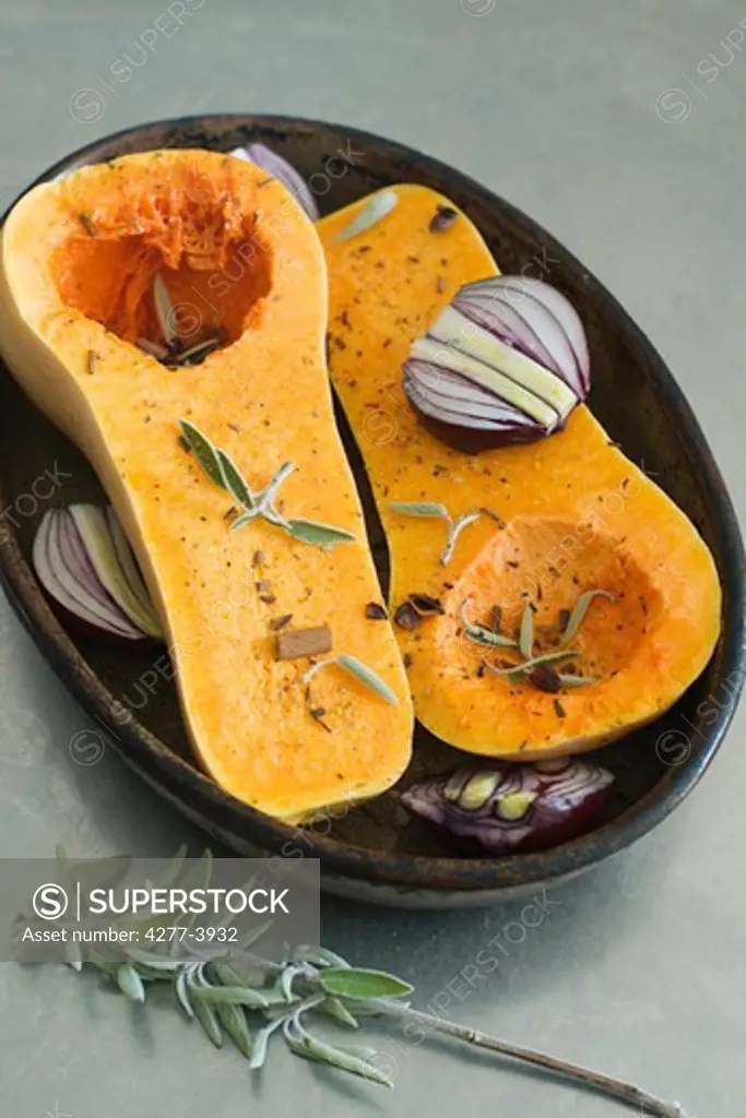 Butternut squash before cooking with herbs