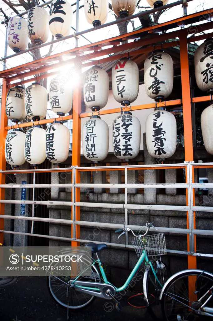 Japanese Lanterns and Parked Bicycle