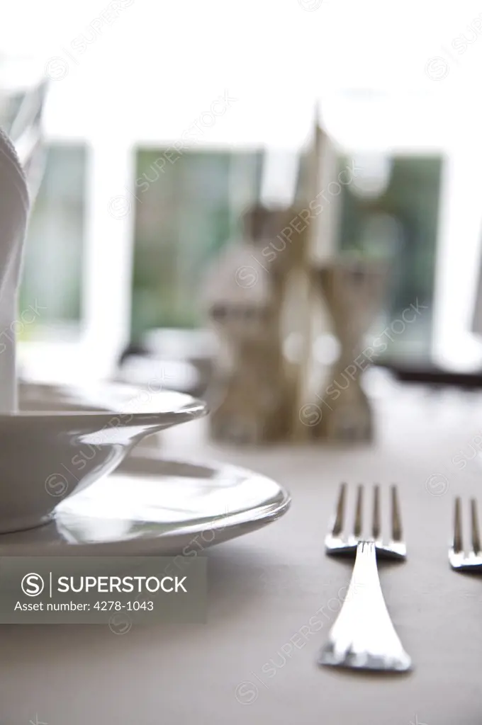 Extreme close up of tableware with forks