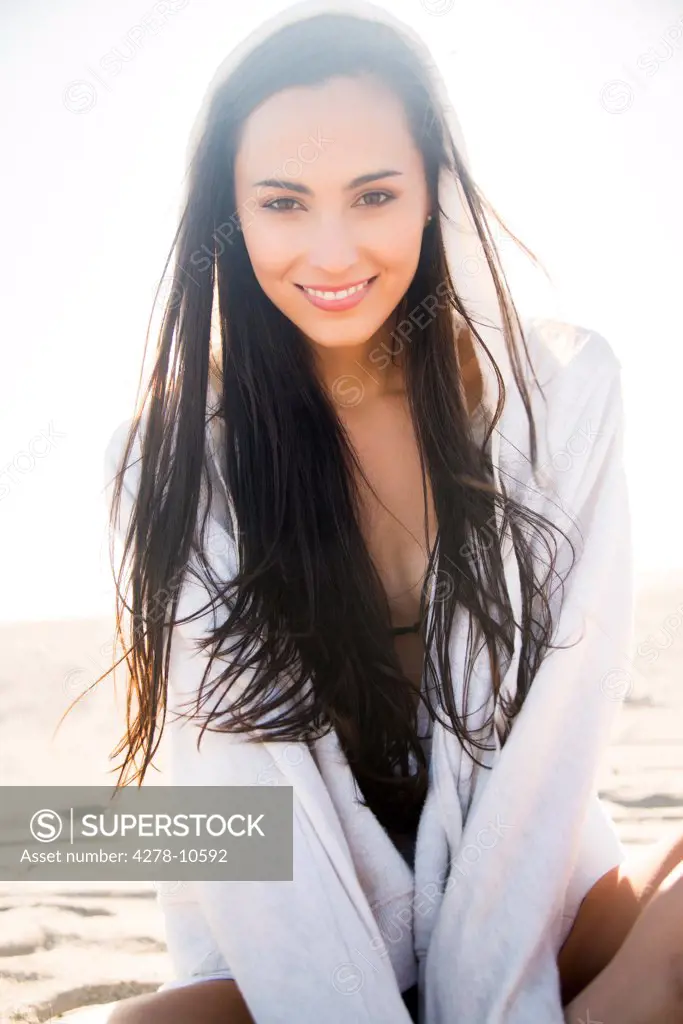 Smiling Young Woman on Beach