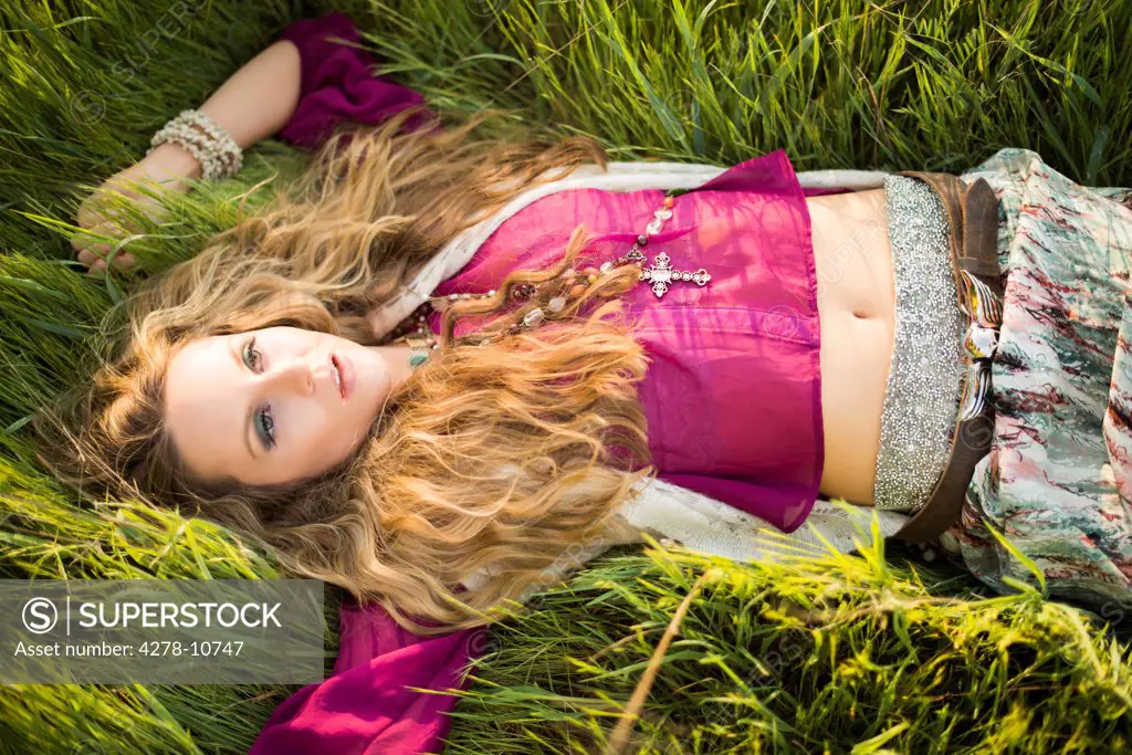 Woman Lying in Long Grass