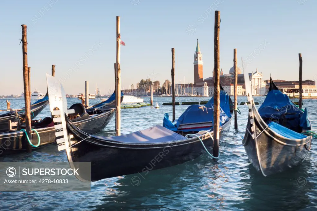 Gondolas and the Island and Church of San Giorgio Maggiore, Venice, Italy
