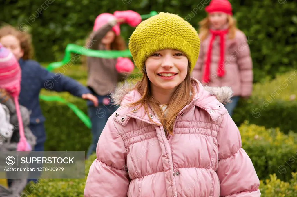 Smiling Young Girl Outdoors