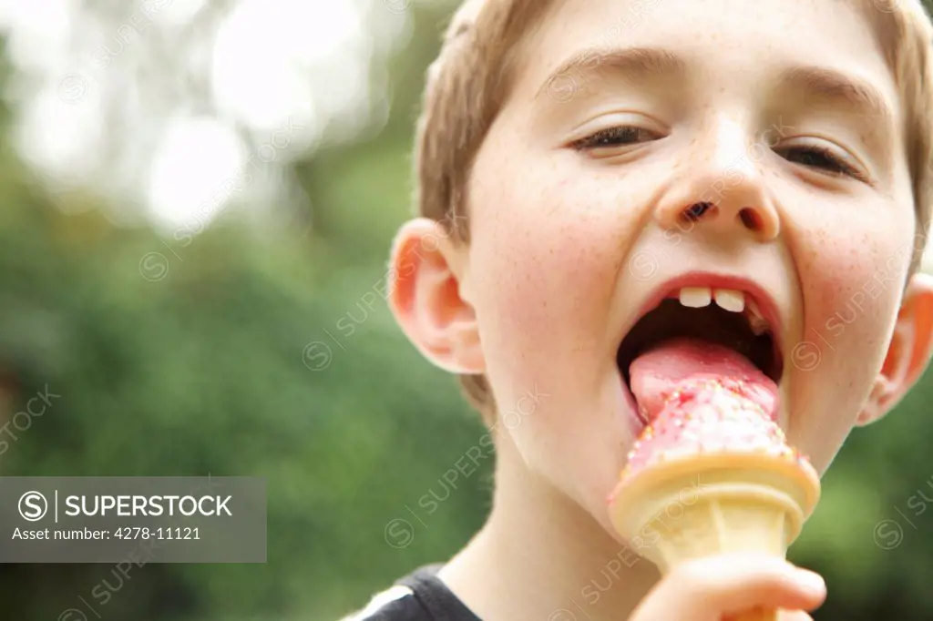 Young Boy Eating Ice Cream