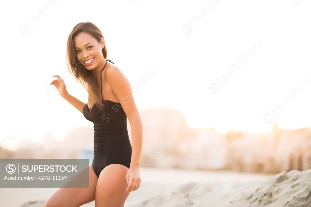 Attractive Woman Smiling on Beach