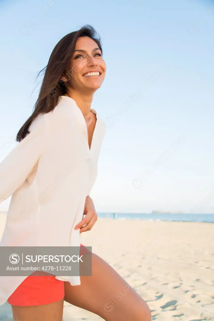 Smiling Woman on Beach