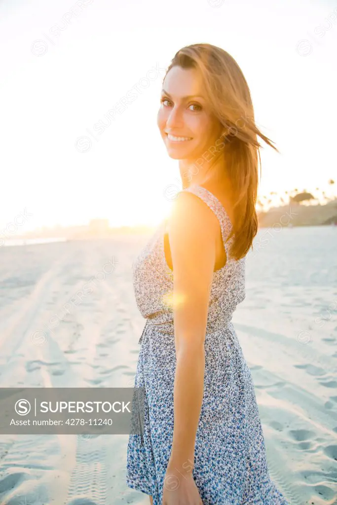 Woman on Beach Looking over Shoulder