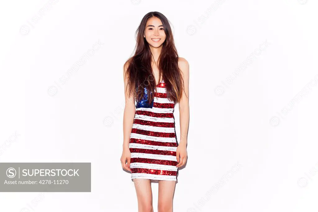 Young Woman Wearing American Flag Sequins Dress