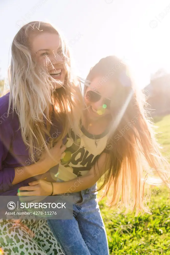 Two Women Laughing Outdoors