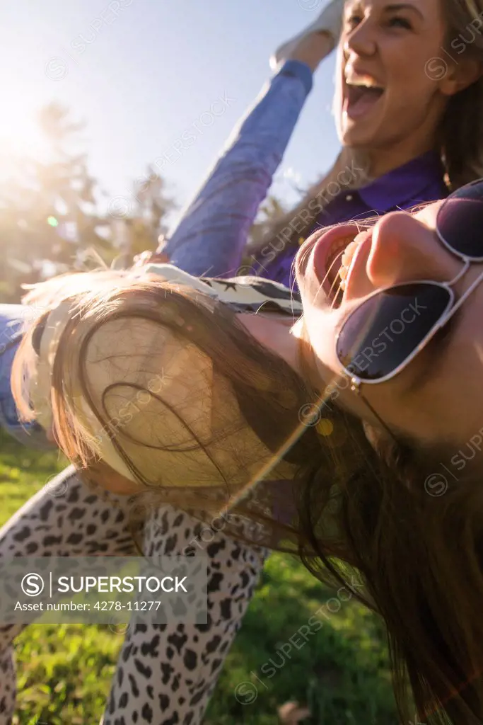 Two Women Messing Around Outdoors